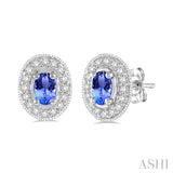 5x3 MM Oval Cut Tanzanite and 1/4 Ctw Round Cut Diamond Earrings in 14K White Gold
