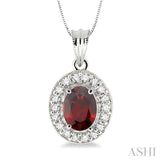 8x6 MM Oval Cut Garnet and 1/3 Ctw Round Cut Diamond Pendant in 14K White Gold with Chain