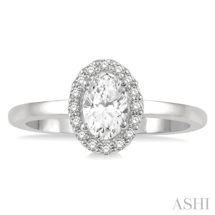 1/3 Ctw Round Cut Diamond Halo Engagement Ring With 1/4 Ct Oval Cut Center Stone in 14K White Gold
