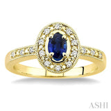 5x3 MM oval cut Sapphire and 1/10 Ctw Round Cut Diamond Ring in 14K Yellow Gold.