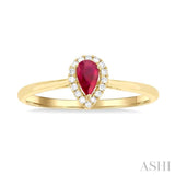 5x3 MM Pear Shape Ruby and 1/20 Ctw Single Cut Diamond Halo Precious Ring in 10K Yellow Gold