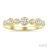 1/2 Ctw Bezel Set Round Cut Diamond Fashion Band in 14K Yellow Gold