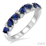 1/6 ctw Pear Shape 4X3MM Sapphire and Round Cut Diamond Precious Band in 14K White Gold