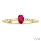 5x3 MM Oval Cut Ruby and 1/10 Ctw Petite Round Cut Diamond Precious Fashion Ring in 10K Yellow Gold