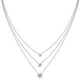 Platinum finish sterling silver necklace. each chain with a round solitaire bezel set simulated diamond on 16 chain