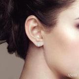 1/5 ctw Petite Bezel Set Pear Shape Fusion Baguette and Round Cut Diamond Fashion Stud Earring in 10K White Gold